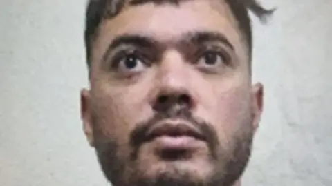 Reuters Image shows Mohamed Amra, also known as "The Fly", who escaped custody on 14 May 2024