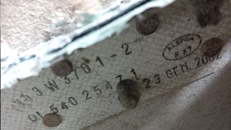 Part number and date stamp on outboard flap of missing Malaysia Airlines jet MH370 found in Tanzania. Pic: Australia Transport Safety Bureau