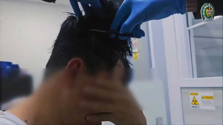 Police found a stash of cocaine hidden under a wig. Pic: Policia De Colombia
