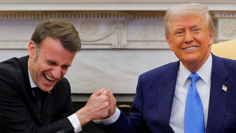 U.S. President Donald Trump and French President Emmanuel Macron react during their meeting at the White House in Washington, D.C., U.S., February 24, 2025. REUTERS/Brian Snyder