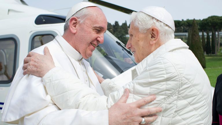 Pope Francis (L) embraces Pope Emeritus Benedict XVI as he arrives at the Castel Gandolfo summer residence March 23, 2013. Pope Francis travelled by helicopter from the Vatican to Castel Gandolfo for a private meeting with the former Pope Benedict XVI. REUTERS/Osservatore Romano (ITALY - Tags: RELIGION TPX IMAGES OF THE DAY) ATTENTION EDITORS - THIS IMAGE WAS PROVIDED BY A THIRD PARTY. FOR EDITORIAL USE ONLY. NOT FOR SALE FOR MARKETING OR ADVERTISING CAMPAIGNS. THIS PICTURE IS DISTRIBUTED EXACTL
