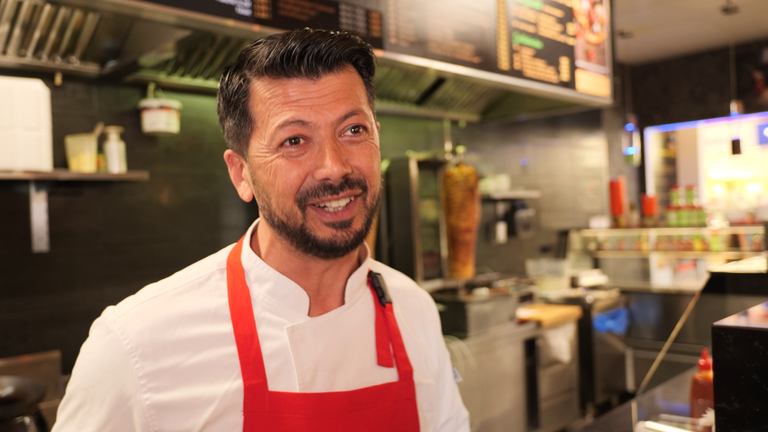 Aliriza Oernek, who owns four restaurants in Zwickau.  SN screengrab from Robbins VT about Trump's tariffs in Germany. FTV PKG GERMAN AUTO TARIFFS ROBBINS ZWICKAU 27032025