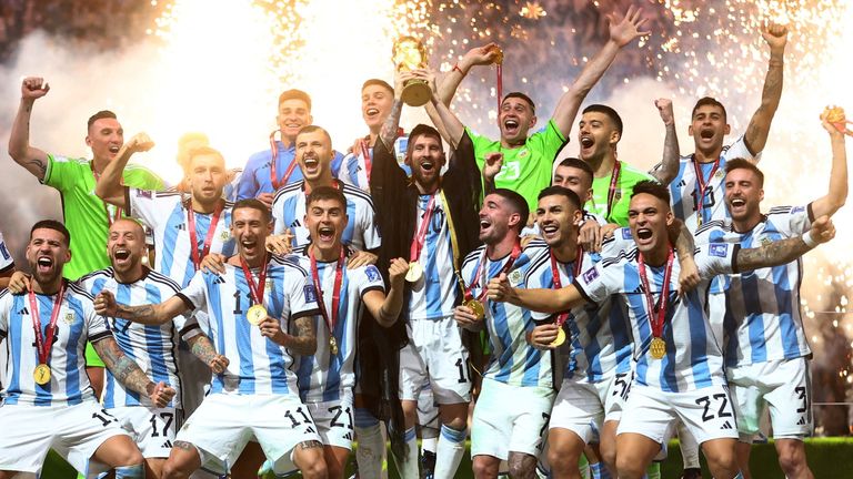 FIFA World Cup Qatar 2022 - Final - Argentina v France - Lusail Stadium, Lusail, Qatar - December 18, 2022 Argentina's Lionel Messi celebrates with the trophy and teammates after winning the World Cup REUTERS/Carl Recine TPX IMAGES OF THE DAY
