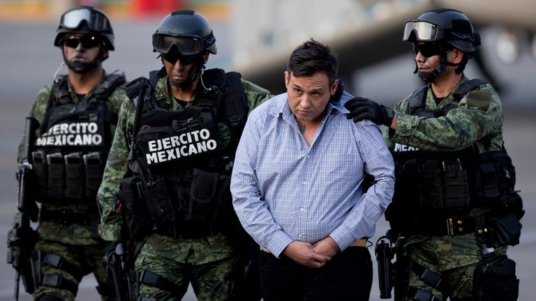 Soldiers escort a man who authorities identified as Omar Trevino Morales, also known as Z-42.  Pic: AP/Eduardo Verdugo