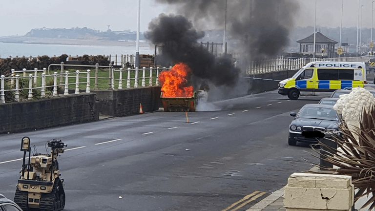 The explosive ordnance disposal team carried out the controlled burn in a skip. Pic: Sussex Police
