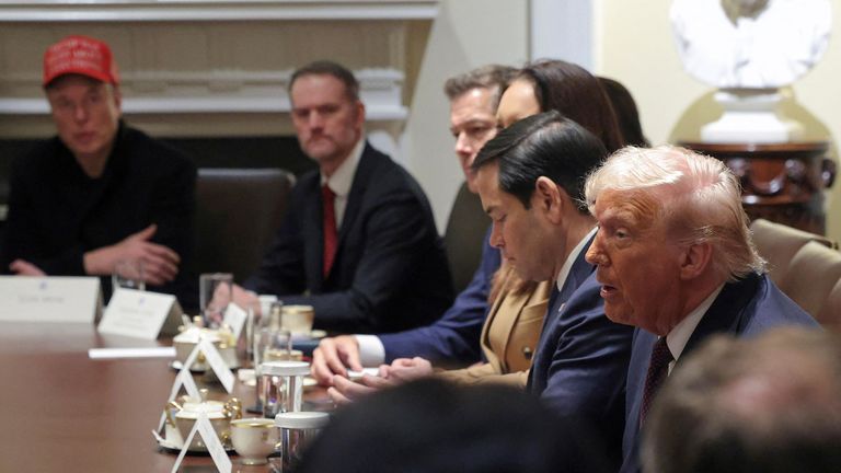President Donald Trump, from right, Secretary of State Marco Rubio and Elon Musk, left, attend a cabinet meeting at the White House in Washington, Monday, March 24, 2025. (Pool via AP)