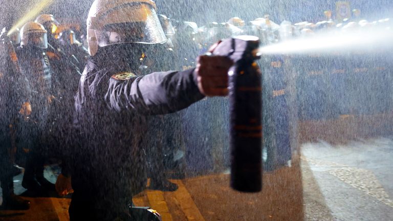 A police officer uses crowd control spray to disperse demonstrators during a protest against the detention of Istanbul Mayor Ekrem Imamoglu, in Istanbul, Turkey, March 22, 2025. REUTERS/Murad Sezer TPX IMAGES OF THE DAY