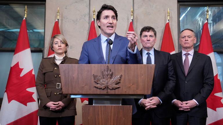 Justin Trudeau holds a news conference on imposed U.S. tariffs as Foreign Affairs Minister Melanie Joly, Finance Minister Dominic LeBlanc and Public Safety Minister David McGuinty look on in Ottawa.  Pic: The Canadian Press/AP
