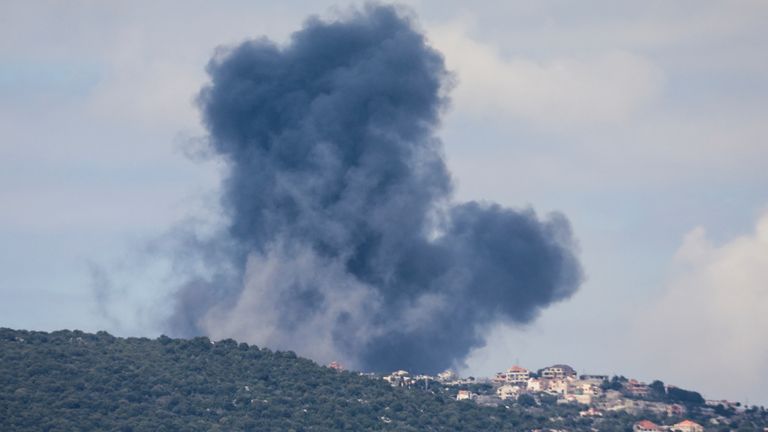Smoke rises from Jabal al-Rihan, following Israeli strikes in response to cross-border rocket fire, as seen from Marjayoun, in southern Lebanon, March 22, 2025. REUTERS/Karamallah Daher