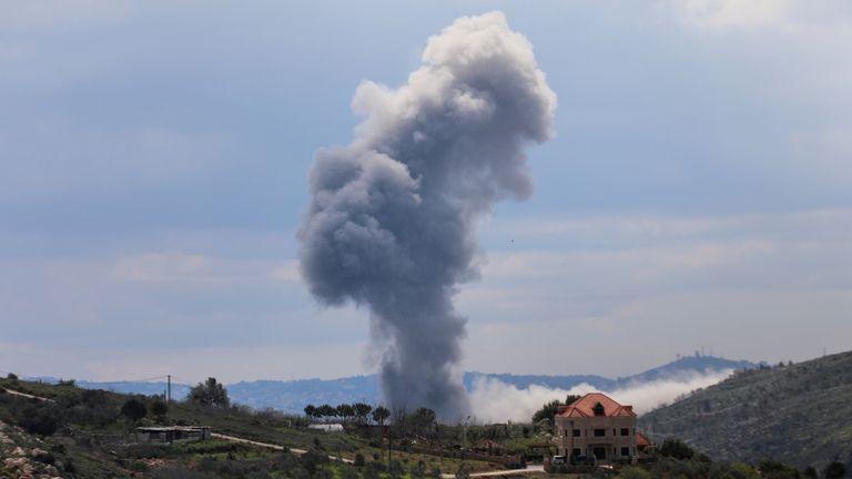 Smoke rises from Taibeh, following Israeli strikes in response to cross-border rocket fire, as seen from Marjayoun in southern Lebanon, March 22, 2025. REUTERS/Karamallah Daher TPX IMAGES OF THE DAY