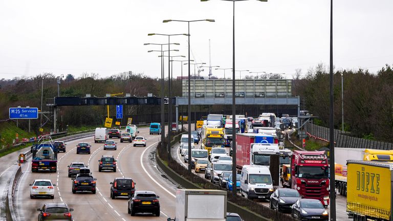 Traffic on the M25 motorway near junction 10 for the A3. Weather warnings remain in force across much of the UK on Monday with adverse conditions, including flooding from heavy rain and thawing snow. Picture date: Monday January 6, 2025. Ben Whitley/PA Wire