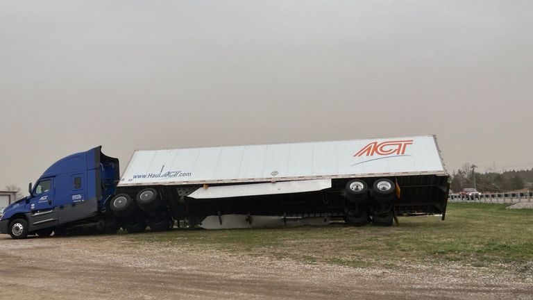 In this photo provided by Missouri State Highway Patrol, a truck is damaged after a severe storm passed the area near Ozark County, Mo., early Saturday, March 15, 2025.  (Missouri State Highway Patrol via AP)