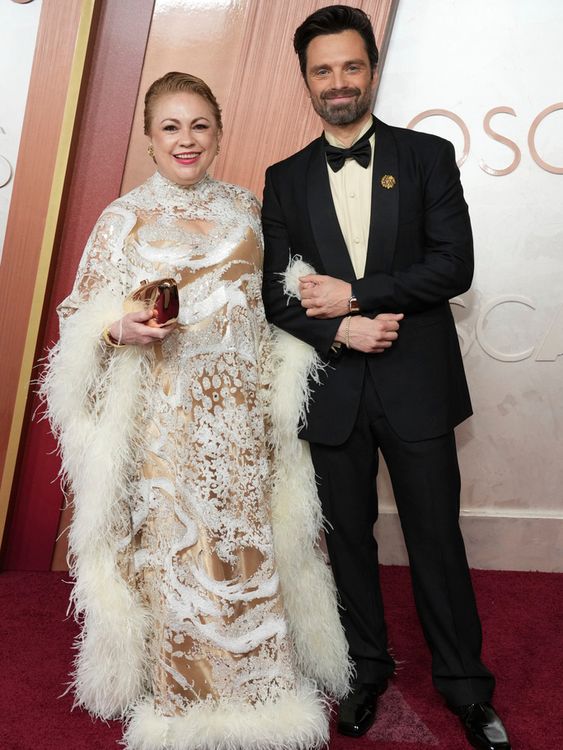 Georgeta Orlovschi, left, and Sebastian Stan arrive at the Oscars on Sunday, March 2, 2025, at the Dolby Theatre in Los Angeles. (Photo by Jordan Strauss/Invision/AP)