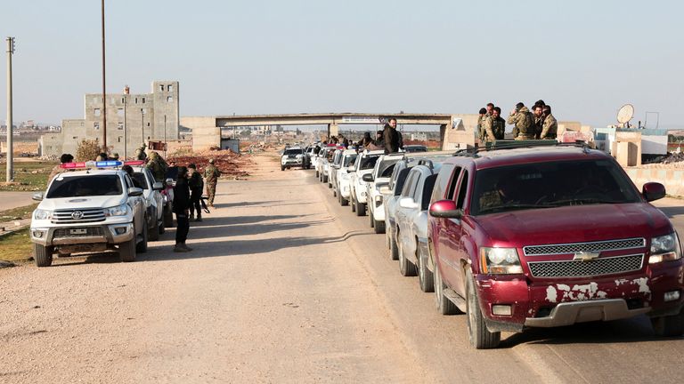 A military convoy heads to clashes against fighters linked to Syria's ousted leader Bashar al Assad in Aleppo on 7 March. Pic: Reuters