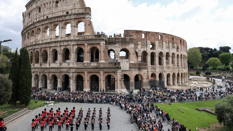 British and Italian military bands stand outside the Colosseum during a state visit by King Charles and Queen Camilla, in Rome, Italy.   Pic: Reuters