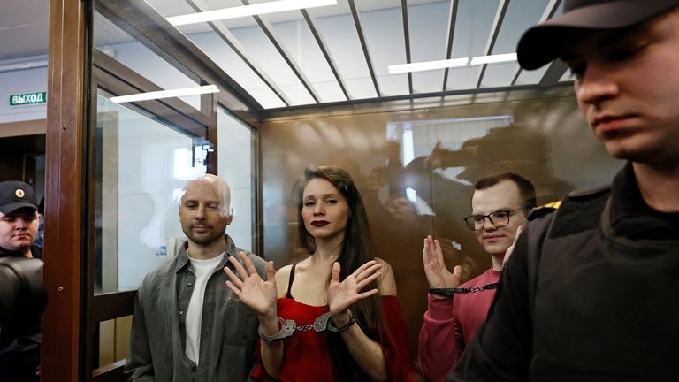 Journalists Sergei Karelin, Antonina Favorskaya and Artem Kriger, accused of taking part in the activities of an "extremist" organization founded by late opposition politician Alexei Navalny, attend a court hearing in Moscow, Russia April 15, 2025. REUTERS/Yulia Morozova