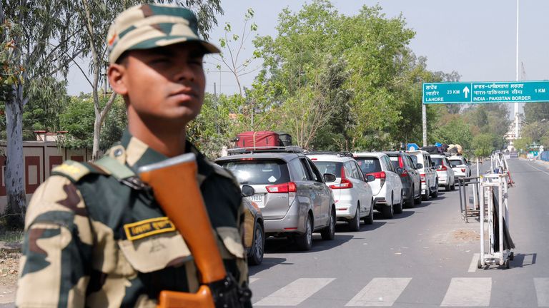 A Border Security Force (BSF) security personnel stands guard at the Attari-Wagah crossing on the India-Pakistan border near Amritsar, following Tuesday’s attack on tourists near south Kashmir’s scenic Pahalgam, India, April 25, 2025. REUTERS/Pawan Kumar REFILE - QUALITY REPEAT