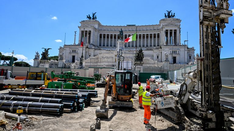 Workers are seen at the subway station construction site near Piazza del Campidoglio (Capitoline Square) in Rome, Italy, May 23, 2024. REUTERS/Alberto Lingria