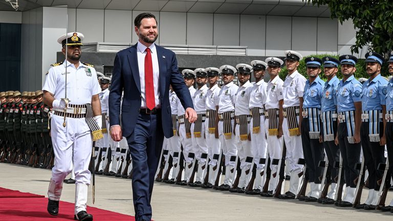 U.S. Vice President JD Vance reviews troops, upon his arrival in New Delhi, India, April 21, 2025. Kenny Holston/Pool via REUTERS