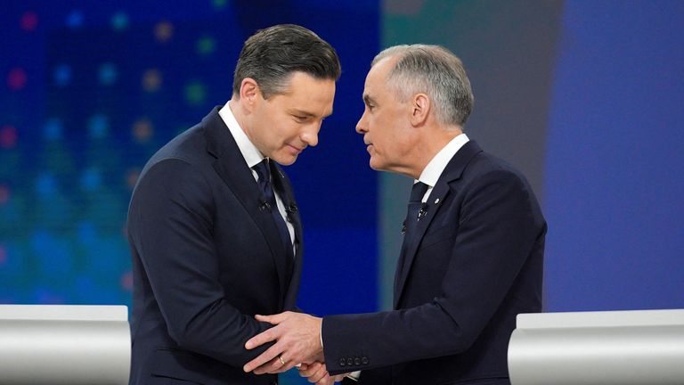 Conservative leader Pierre Poilievre and liberal Leader Mark Carney shake hands after the English-language federal leaders' debate in Montreal. Pic: Reuters