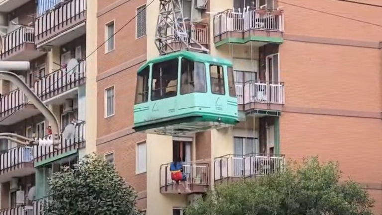 People being rescued from a second cable car that became stuck after the incident