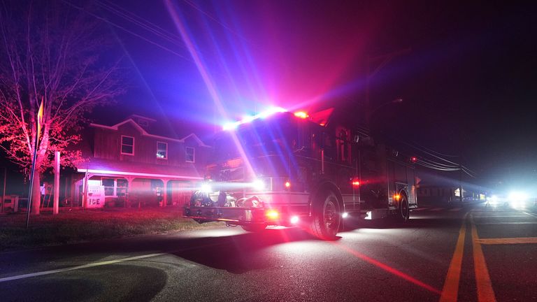 Firefighters respond to a wildfire on Tuesday, April 22, 2025, in Waretown, N.J. (AP Photo/Chris Szagola)