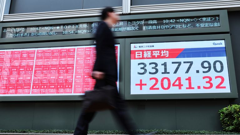 A display shows the sharp rising of the Nikkei average stock price on the rebound in Chuo Ward, Tokyo on April 8, 2025. U.S. President Donald Trump announced details of the reciprocal tariffs. Worldwide stock prices had continued to fall until April 7th. ( The Yomiuri Shimbun via AP Images )