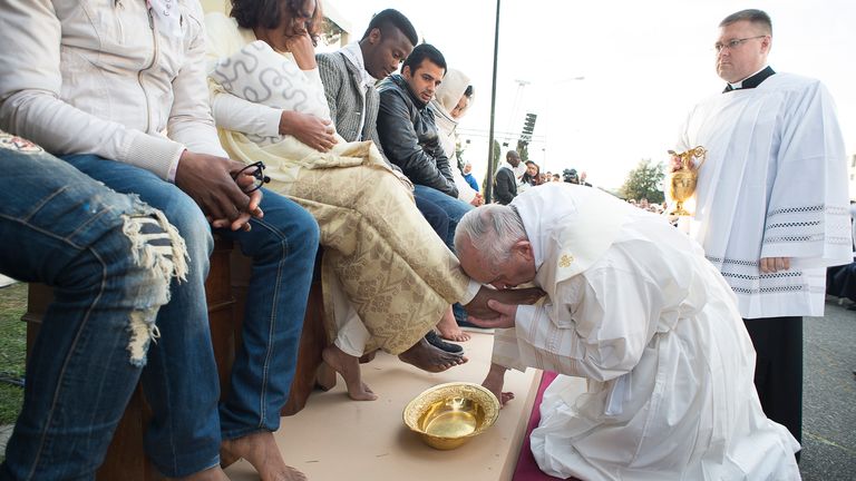 Pope Francis washes the feet of refugees, in 2016, declaring them all children of god.  Pic: AP