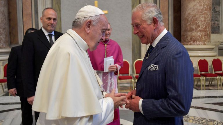 FILE PHOTO: Pope Francis speaks with Britain's Prince Charles on the day of the canonisation of 19th-century British cardinal John Henry Newman at the Vatican October 13, 2019. Vatican Media/Handout via REUTERS    THIS IMAGE HAS BEEN SUPPLIED BY A THIRD PARTY./File Photo