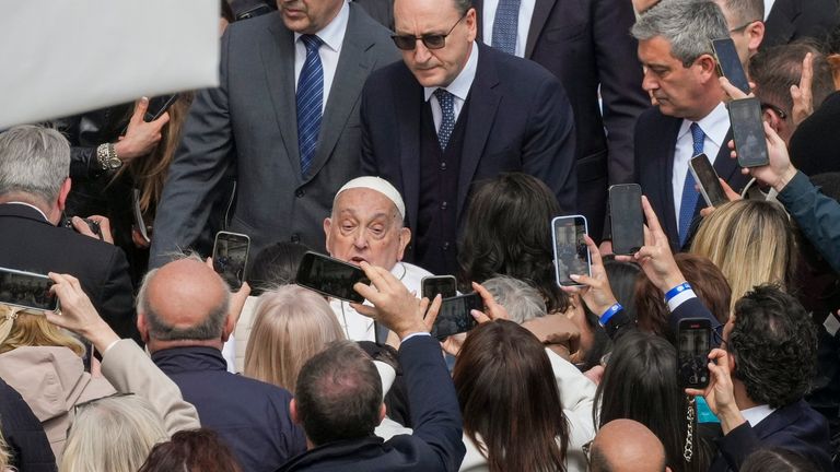 Pope Francis arrives at the end of the mass. Pic: AP