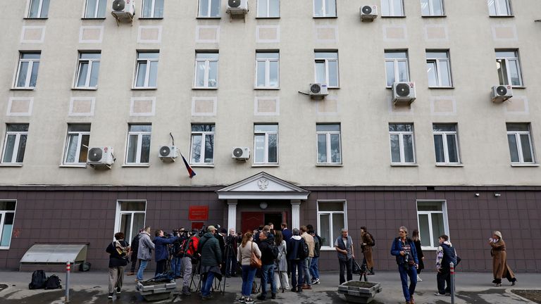 People gather outside Nagatinsky District Court before the start of a hearing in the case of four journalists accused of taking part in the activities of an "extremist" organization founded by late opposition politician Alexei Navalny, in Moscow, Russia April 15, 2025. REUTERS/Yulia Morozova