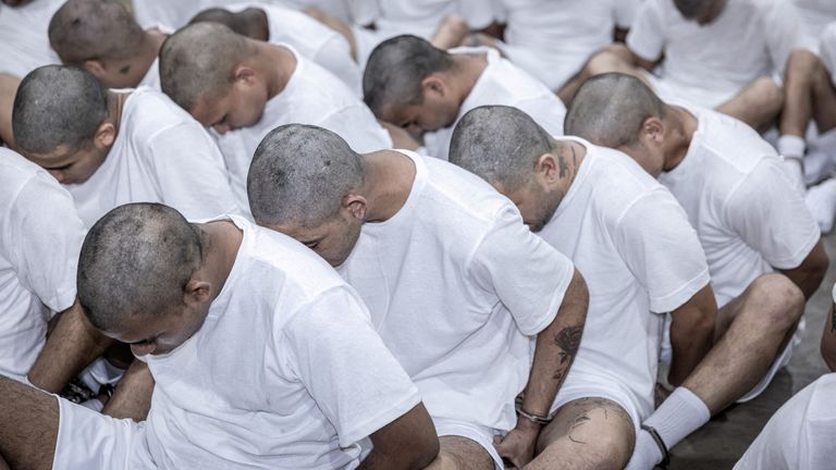 Alleged members of the Venezuelan gang Tren de Aragua deported by US are processed to be imprisoned in the CECOT prison in EL Salvador. Pic: Reuters