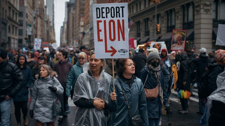 Demonstrators march during a "Hands Off!" protest against President Donald Trump on Saturday, April 5, 2025, in New York. (AP Photo/Andres Kudacki)