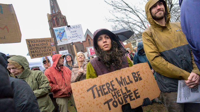 Hundreds of people show up to protest President Donald Trump at Centre Congregational Church in Brattleboro, Vt., during a national "Hands Off" protest on Saturday, April 5, 2025. (Kristopher Radder/The Brattleboro Reformer via AP)