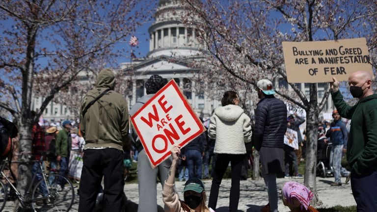 People participate in a protest at the Utah State Capitol building in a demonstration that is part of larger "Hands off" events organized nationwide against U.S. President Donald Trump, in Salt Lake City, Utah, U.S., April 5, 2025. REUTERS/Jim Urquhart