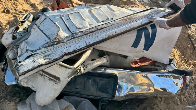 The crushed remains of a UN vehicle found at the site of the mass grave. Pic: UN