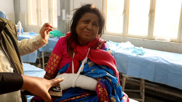 A woman is treated in hospital after being injured in the attack. Pic: Reuters