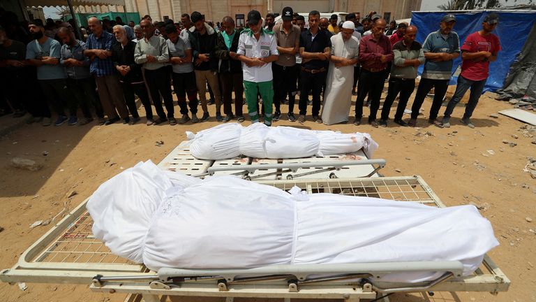 Mourners attend the funeral of Palestinians killed in Israeli strikes, at the Indonesian hospital in Beit Lahia, in the northern Gaza Strip, May 15, 2025. REUTERS/Mahmoud Issa