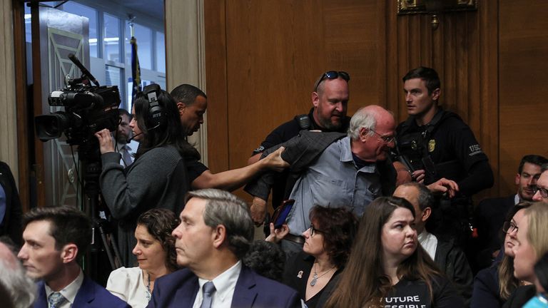 Mr Cohen was dragged out along with a number of other protesters.  Pic: Reuters