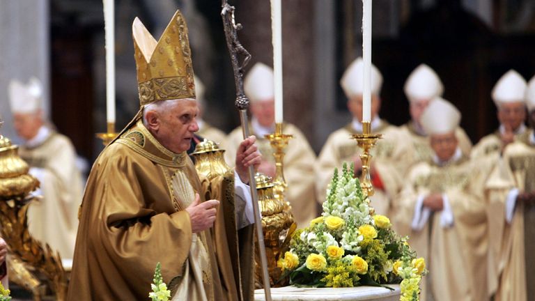 Pope Benedict XVI starts his procession through the St Peter's Basilica in the Vatican before his inaugural Mass April 24, 2005. Pic: Reuters