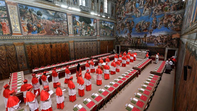 Cardinals arrive to attend the first day of the conclave to elect the successor of late Pope Francis inside the Sistine Chapel at the Vatican, Wednesday, May 7, 2025. (Vatican Media via AP)