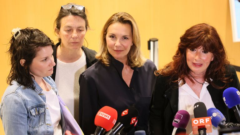 From left, a plaintiff's lawyer Claude Vincent, lawyer Catherine Le Magueresse, victim Amelie , a plaintiff's lawyer Carine Durrieu Diebolt speak with the media outside a Paris court, after a verdict was delivered on accusations that French actor Gerard Depardieu sexually assaulted two women who were working on a film with him in 2021, in Paris, Tuesday, May 13, 2025. (AP Photo/Thomas Padilla)
