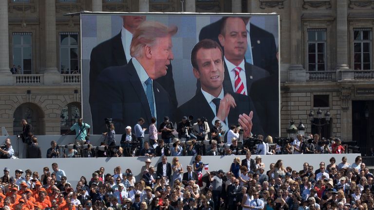Donald Trump watching a Bastille Day parade on the Champs Elysees in 2017. Pic: AP