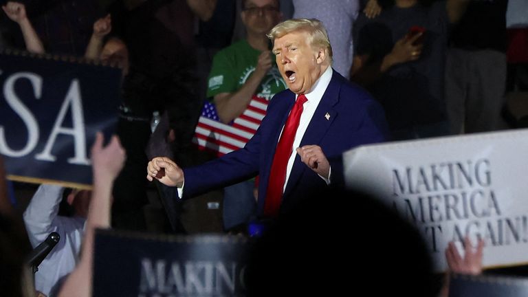 Donald Trump dances at the end of his rally. Pic: Reuters