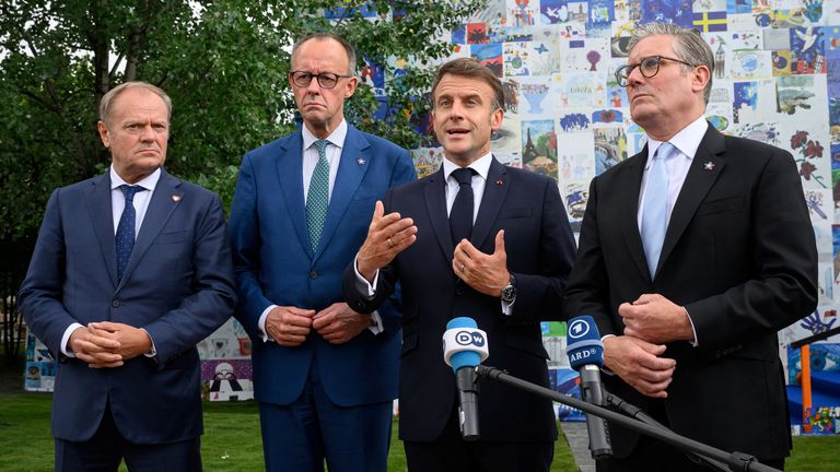 Donald Tusk, Friedrich Merz, Emmanuel Macron and Keir Starmer talk to the press after their meeting.  Pic: Reuters