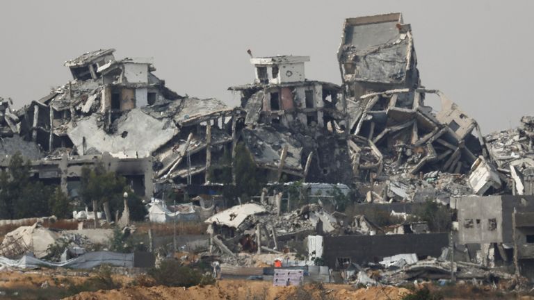 A general view of destruction in North Gaza, as seen from the Israeli side of the Israel-Gaza border, May 17, 2025. REUTERS/Amir Cohen
