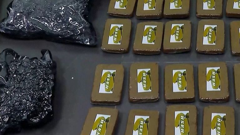 Police footage showed sealed packages. Pic: AP
