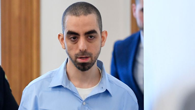 Hadi Matar, right, charged with severely injuring author Salman Rushdie in a 2022 knife attack, is led in to Chautauqua County court in Mayville, N.Y., Monday, Feb. 10, 2025. (AP Photo/Adrian Kraus)