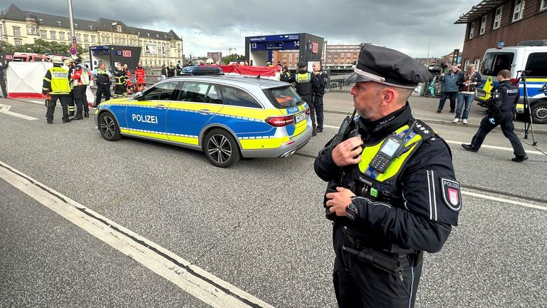 Police at the scene of a stabbing at Hamburg Central Station. Pic: AP