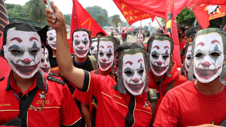 Labourers wear Joker masks as they attend a protest during a May Day rally in Jakarta.  Pic: Reuters